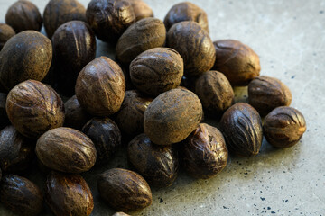 Nutmeg pile on a concrete table 