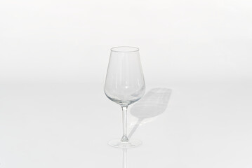 Empty wine glass for red wine on a white background.