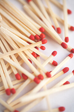 close up of matches on a white background