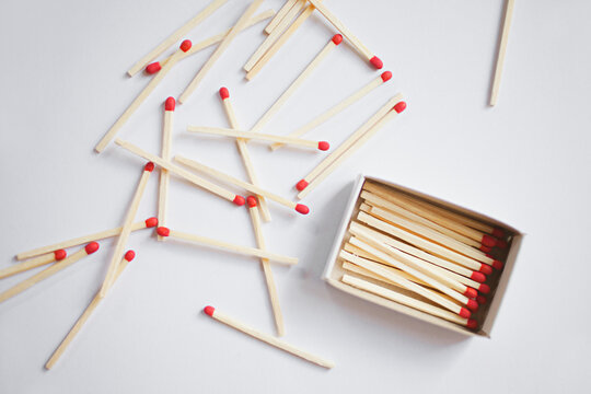 close up of matches on a white background