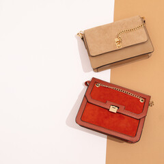 Stylish autumn accessories flat lay minimal. Clutch bags set. Fall winter fashion concept. Design...