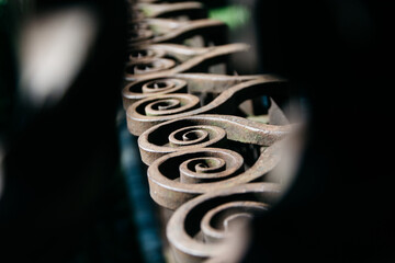wrought iron spirals on a fence