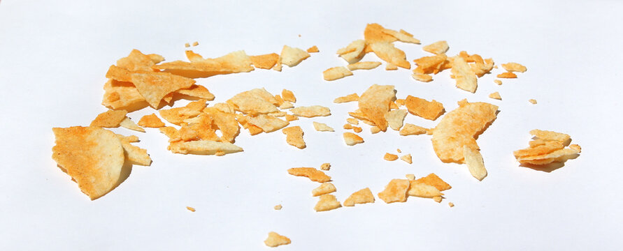 Potato Chips Crumbs Isolated On White Background. Snack