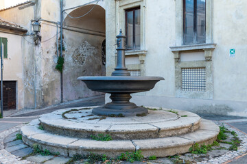 Fototapeta na wymiar fountain placed in square of Risorgimento in the town of Collescipoli