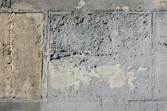 Detail of worn paint on urban wall, Paris, France