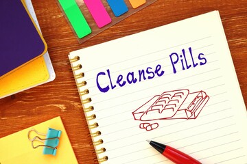 Weightloss concept about Cleanse Pills with inscription on the page.