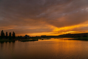 sunset over a small lake in summer in Bashkiria