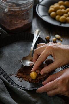 preparing handmade cocoa truffles