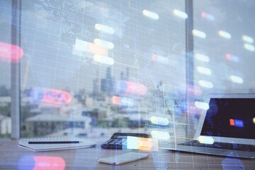 Double exposure of desktop computer and technology theme hologram. Concept of software development.