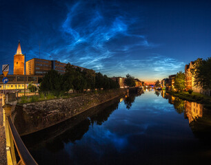 Noctilucent clouds above Opole old City.
