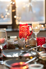 christmas, holidays and eating concept - table served for festive dinner at home