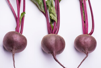 Vegetable pattern with fresh natural beet on a white background. Copy space.
