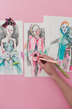 Woman Making Sketches for Costume Design