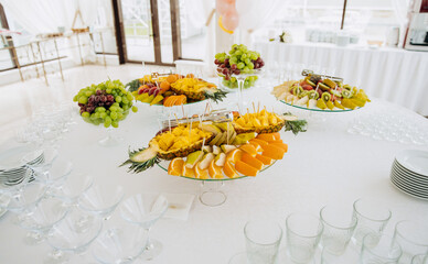 Fruit slices: pineapples, peaches, grapes and others.