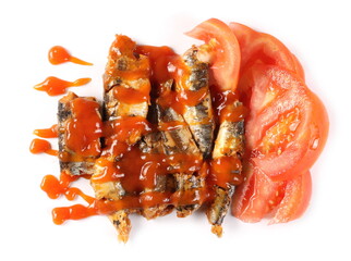 Cooked sardines in oil with tomato sauce and slices isolated on white background, top view