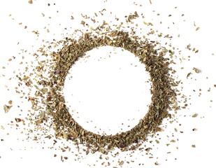 Dried and chopped up basil spice pile arranged in round blank frame and border isolated on white background, top view