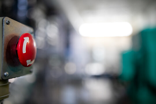 Big red button round shape, close-up.