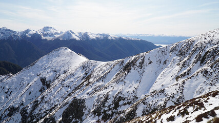 Snowy white Kepler Track during spring in Fiordland National Park of the South Island of New Zealand.
