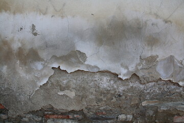 texture di muro rovinato di cemento e mattoni rossi