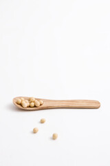 soybean on wooden spoon