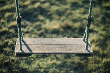 Detail of swing in a nostalgic setting