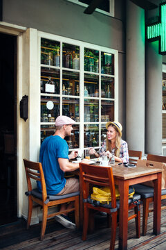 Young Couple Having Lunch at a Restaurant