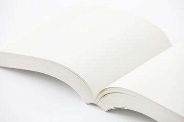 opened book on white background