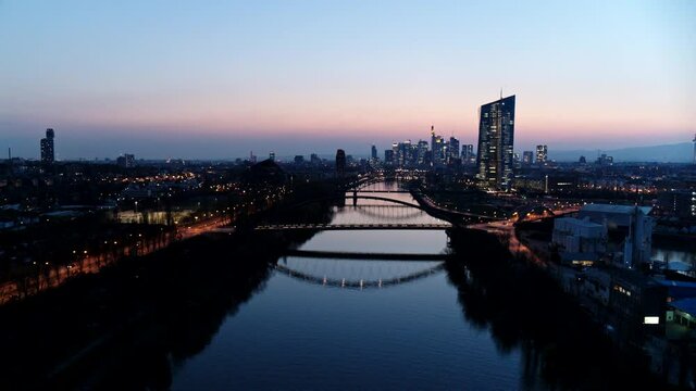 Scenic cityscape and river view at dusk, Frankfurt, Hesse, Germany
