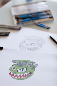 Drawings with pens and markers on a table
