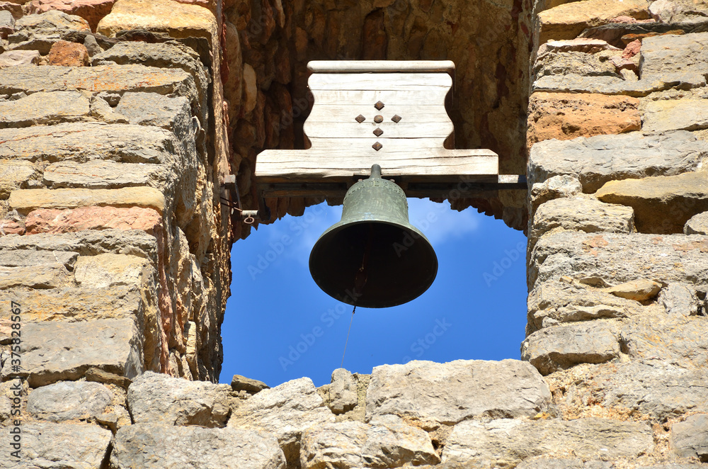 Sticker Old Bell on an Old Spanish Church Made of Stone