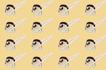 Pattern with Sushi rolls that are taken with sticks on a beige background.