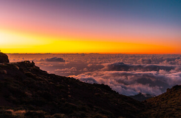 Fototapeta premium Sunset from the Caldera de Taburiente with a beautiful sea of clouds below, La Palma, Canary Islands. Spain