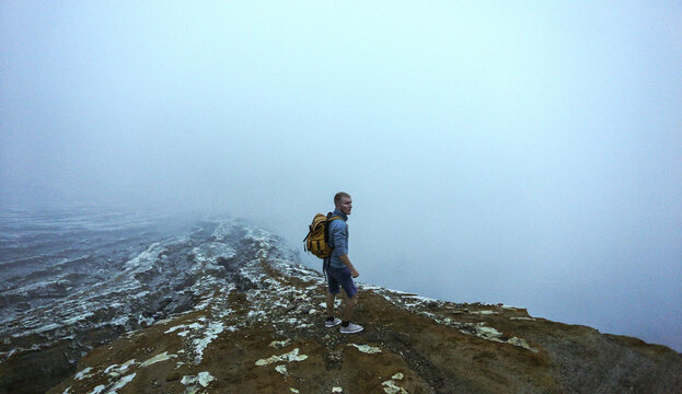 Male traveler hiking