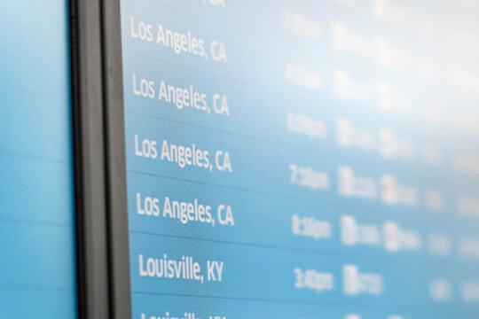 Departure board showing flights to Los Angeles