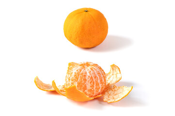 Orange and peeled orange on white background