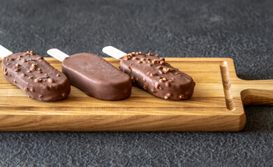 Chocolate-covered vanilla ice cream bars