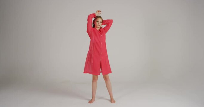 4K Slow Mo Of Fit Female Model Posing In Midi Neon Dress