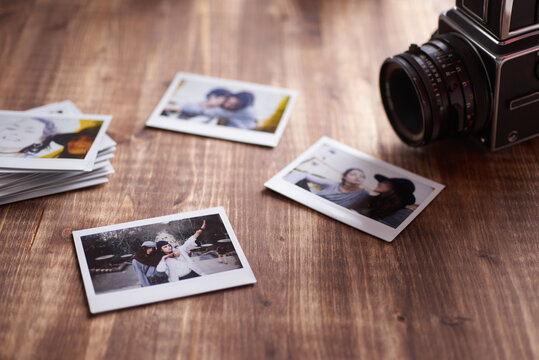 instax camera and some polaroids