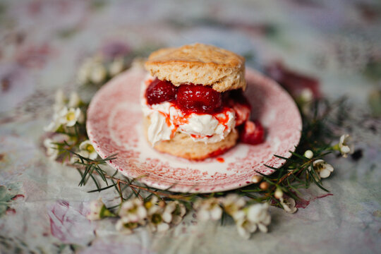Scone with clotted cream and strawberry jam