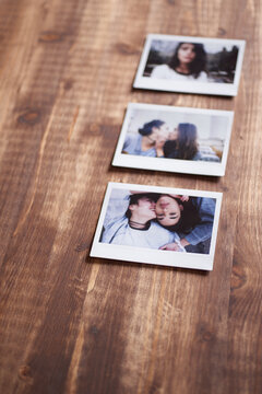 three polaroids forming a row