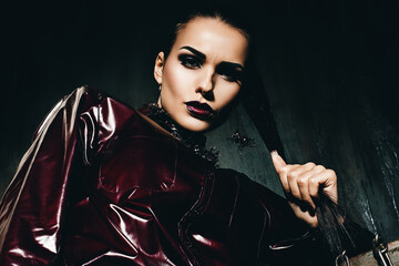 portrait of hot woman in claret glossy shirt