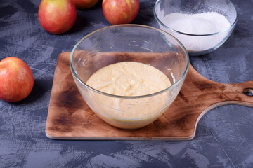 Step by step recipe for making pie with fruits and nuts. Mixed sugar, butter and eggs in the bowl. process of cooking the dessert
