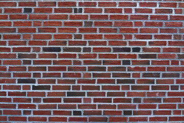 Fototapeta premium Red clay brick wall.