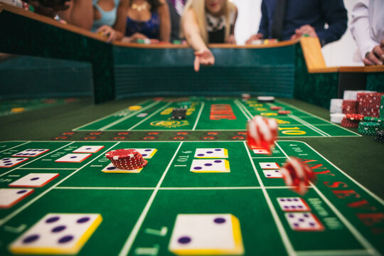 Casino: Woman Gives Dice A Throw In Craps Game
