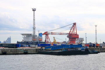 Naklejka premium August 21 2020 - Rostock-Warnemünde, Mecklenburg-Vorpommern/Germany: Details of the industry port and dockside cranes at the europort harbour in Rostock