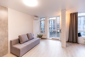 Kitchen and living room of loft apartment