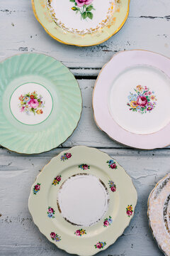 overhead of vintage plates with floral patterns
