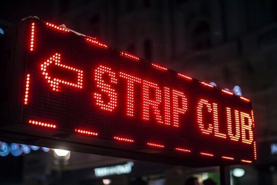 strip club red neon sign