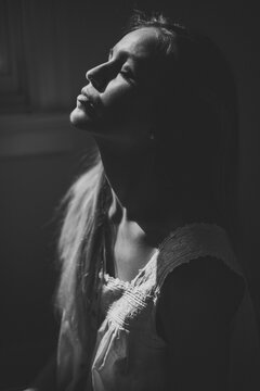 Creative black and white portrait of young woman