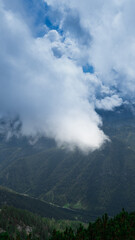 time lapse clouds over the mountains